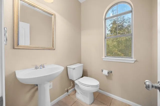 a kitchen with stainless steel appliances a stove sink and microwave