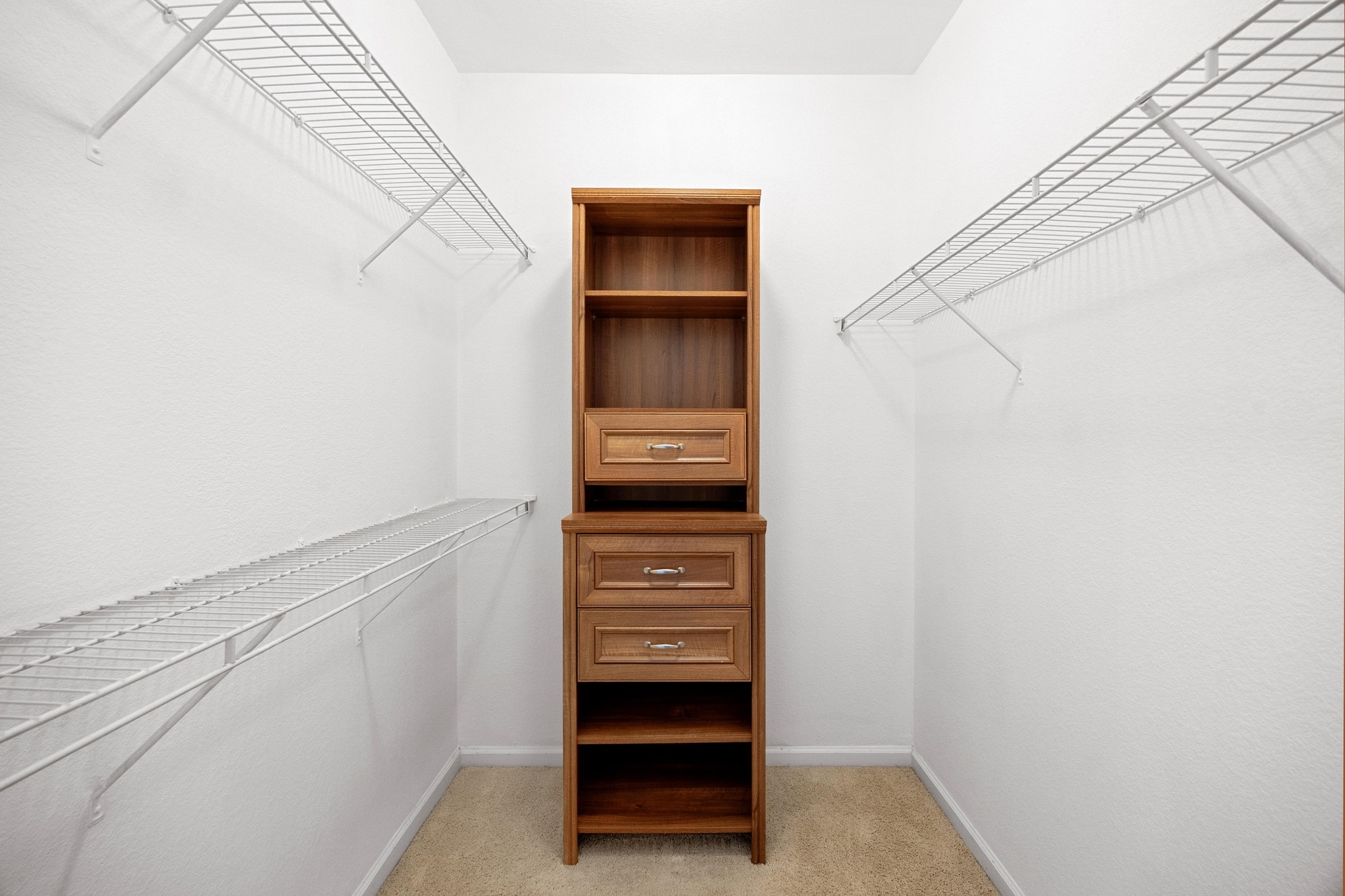 11203 Ranch Road 2222, Unit 1105 Austin, TX 78730 - Photo 15 of 35 Spacious closet with light carpet