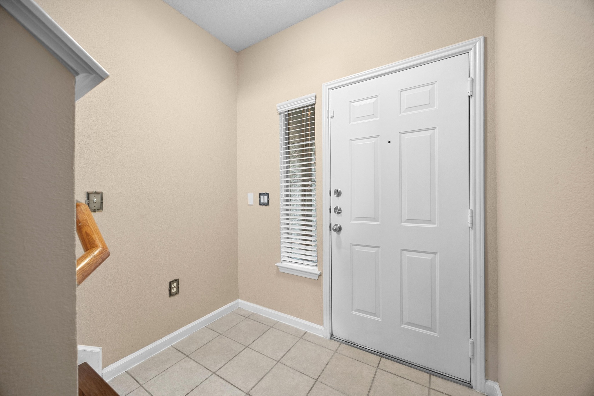 11203 Ranch Road 2222, Unit 1105 Austin, TX 78730 - Photo 21 of 35 Entrance foyer featuring baseboards and light tile patterned floors