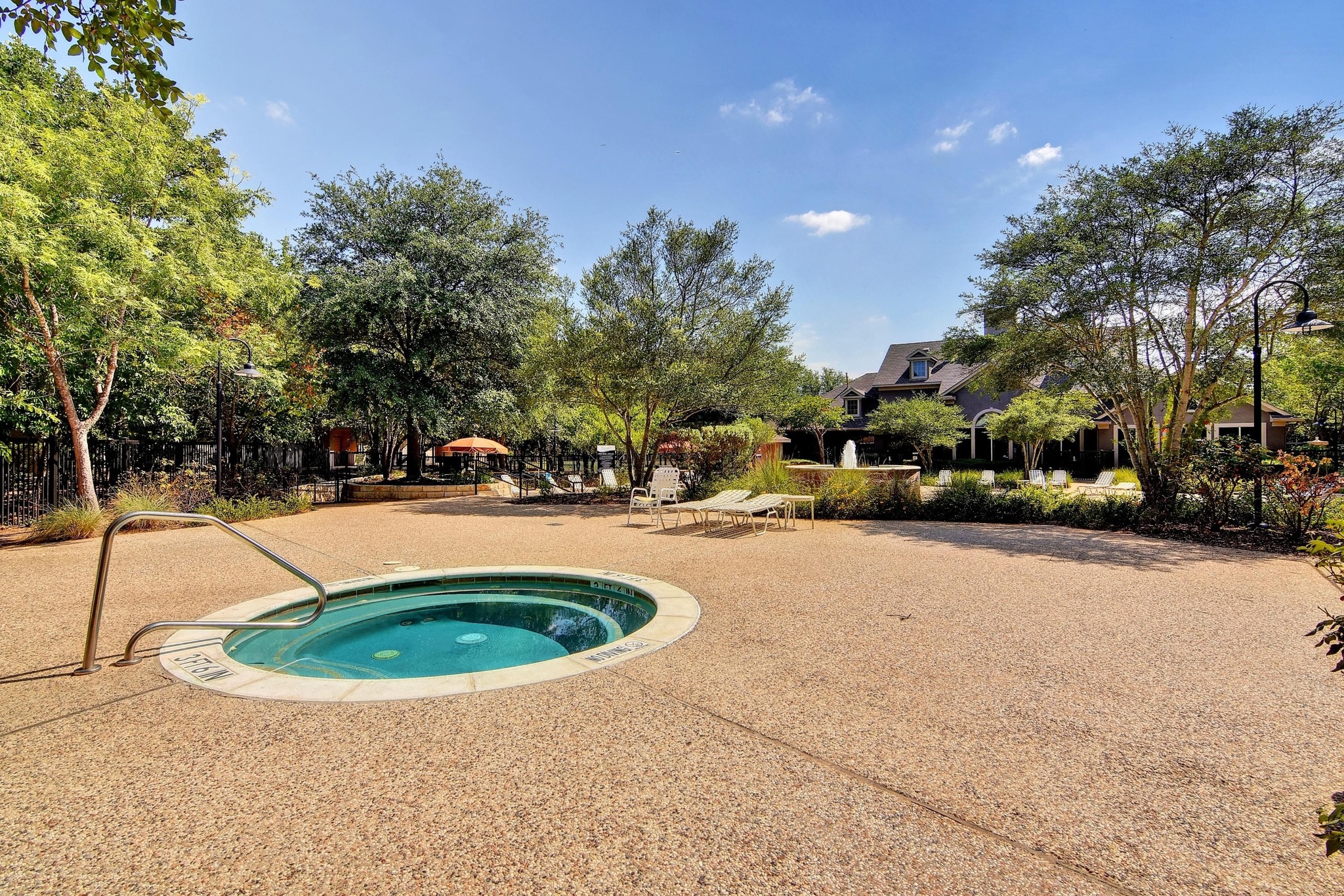 11203 Ranch Road 2222, Unit 1105 Austin, TX 78730 - Photo 34 of 35 View of pool featuring a hot tub and a patio