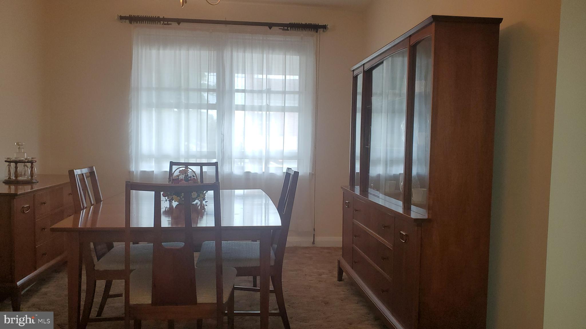 1911 Barry Road Baltimore, MD 21222 - Photo 6 of 22 Dining Room-Wood Floors under Carpet