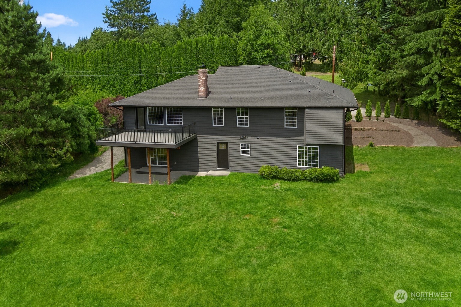 25106 47th Avenue Northeast Arlington, WA 98223 - Photo 11 of 30 front view of a house with a yard