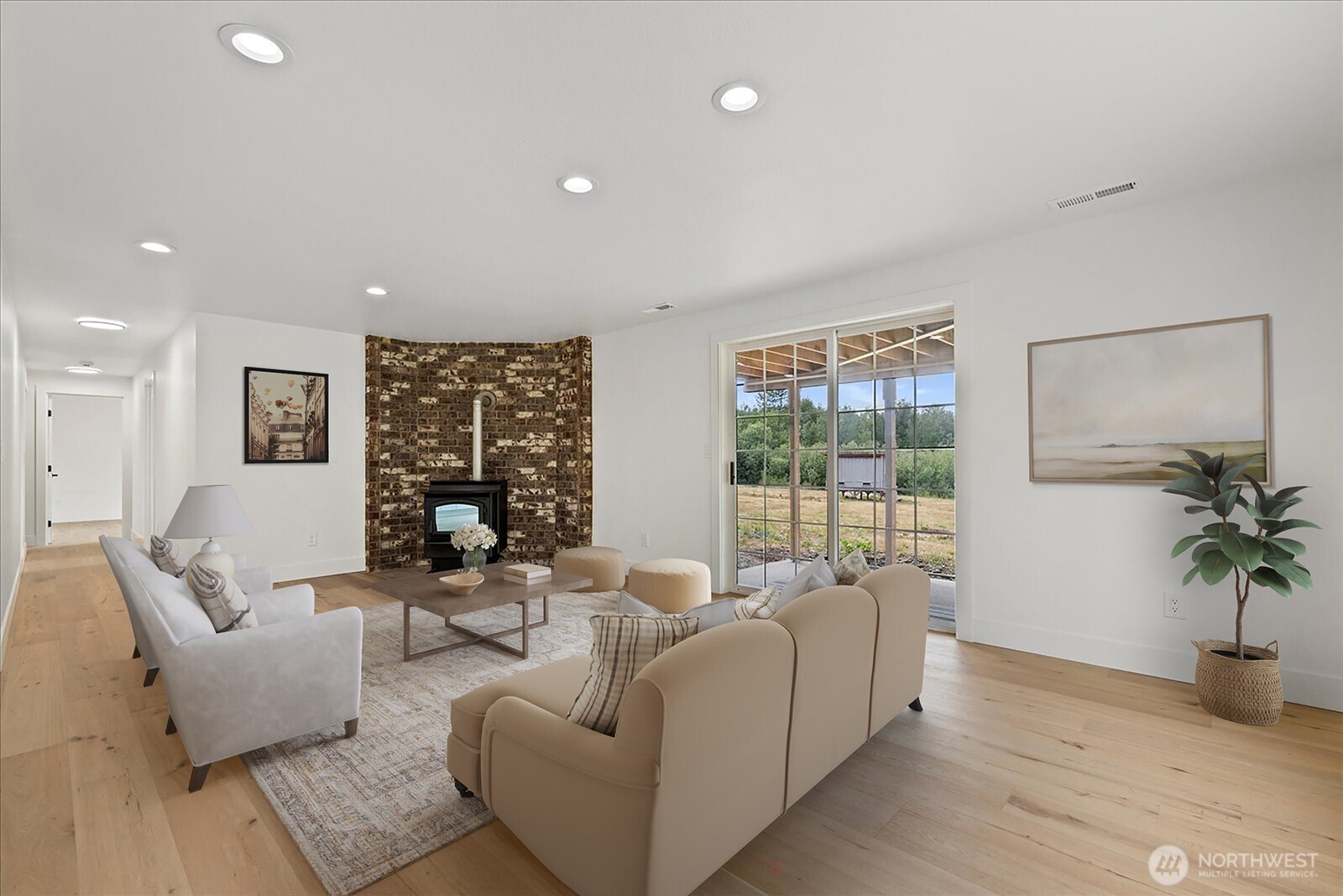 25106 47th Avenue Northeast Arlington, WA 98223 - Photo 23 of 30 a living room with furniture and a large window