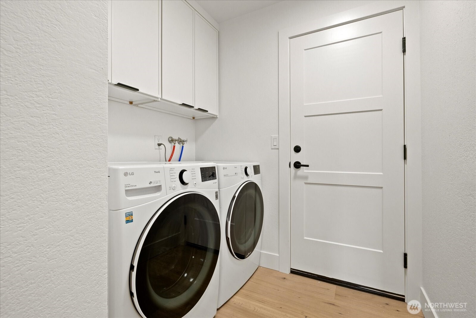 25106 47th Avenue Northeast Arlington, WA 98223 - Photo 28 of 30 a close up view of a washer and dryer