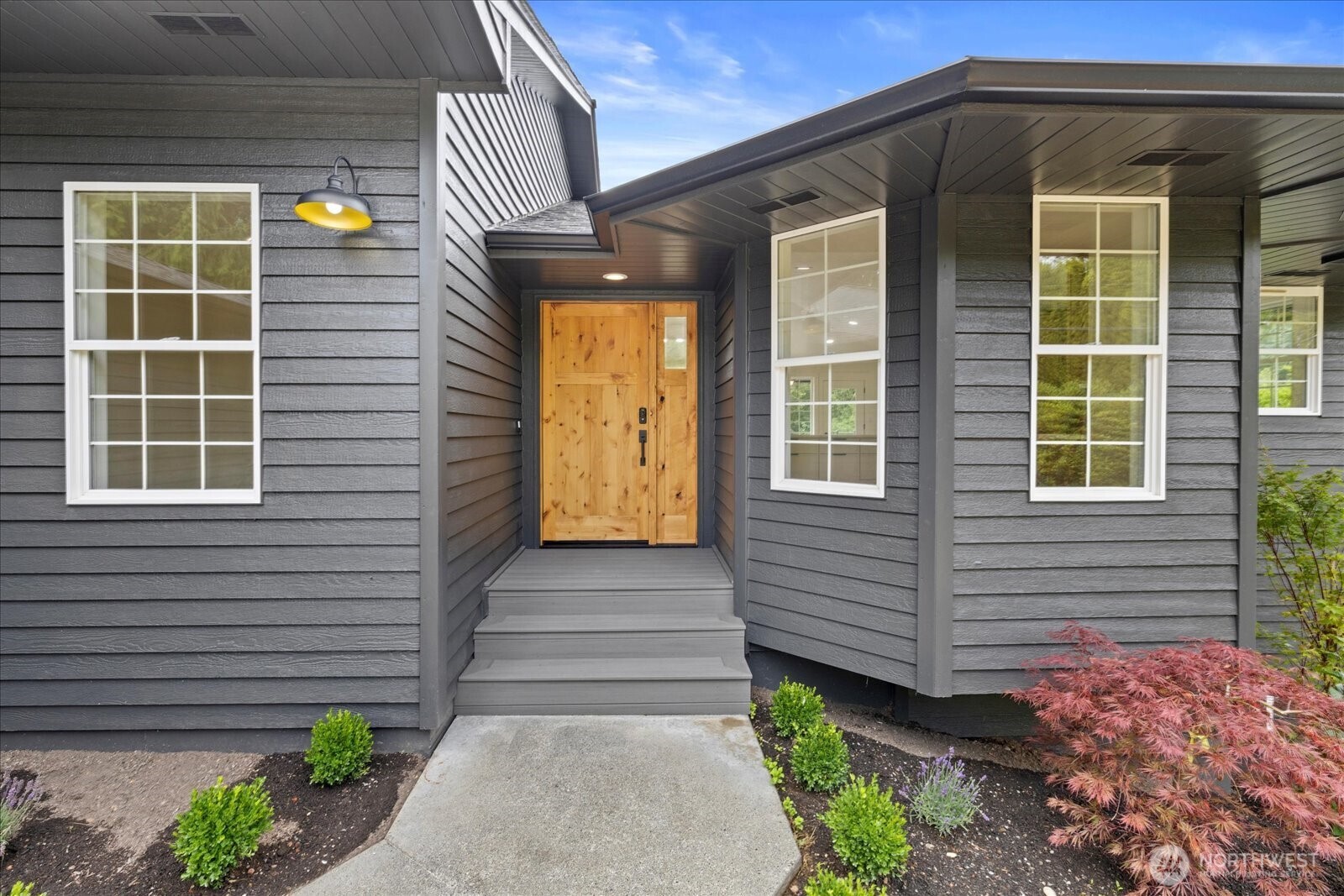 25106 47th Avenue Northeast Arlington, WA 98223 - Photo 29 of 30 a front view of a house with a yard