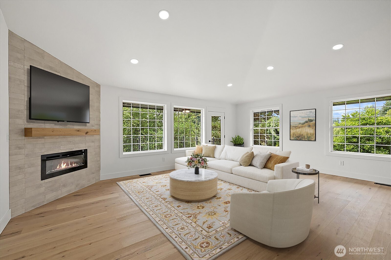 25106 47th Avenue Northeast Arlington, WA 98223 - Photo 5 of 30 a living room with fireplace furniture and a flat screen tv