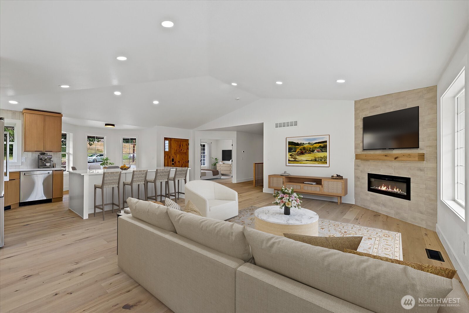 25106 47th Avenue Northeast Arlington, WA 98223 - Photo 7 of 30 a living room with furniture a fireplace and a flat screen tv