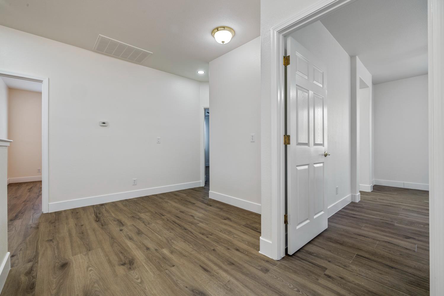 3105 Ripple Court Modesto, CA 95355 - Photo 30 of 46 a view of hallway with wooden floor