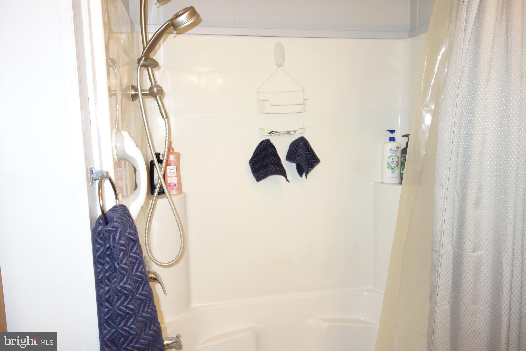 106 Circle Drive Nottingham, PA 19362 - Photo 13 of 16 a bathroom with a shower and a sink