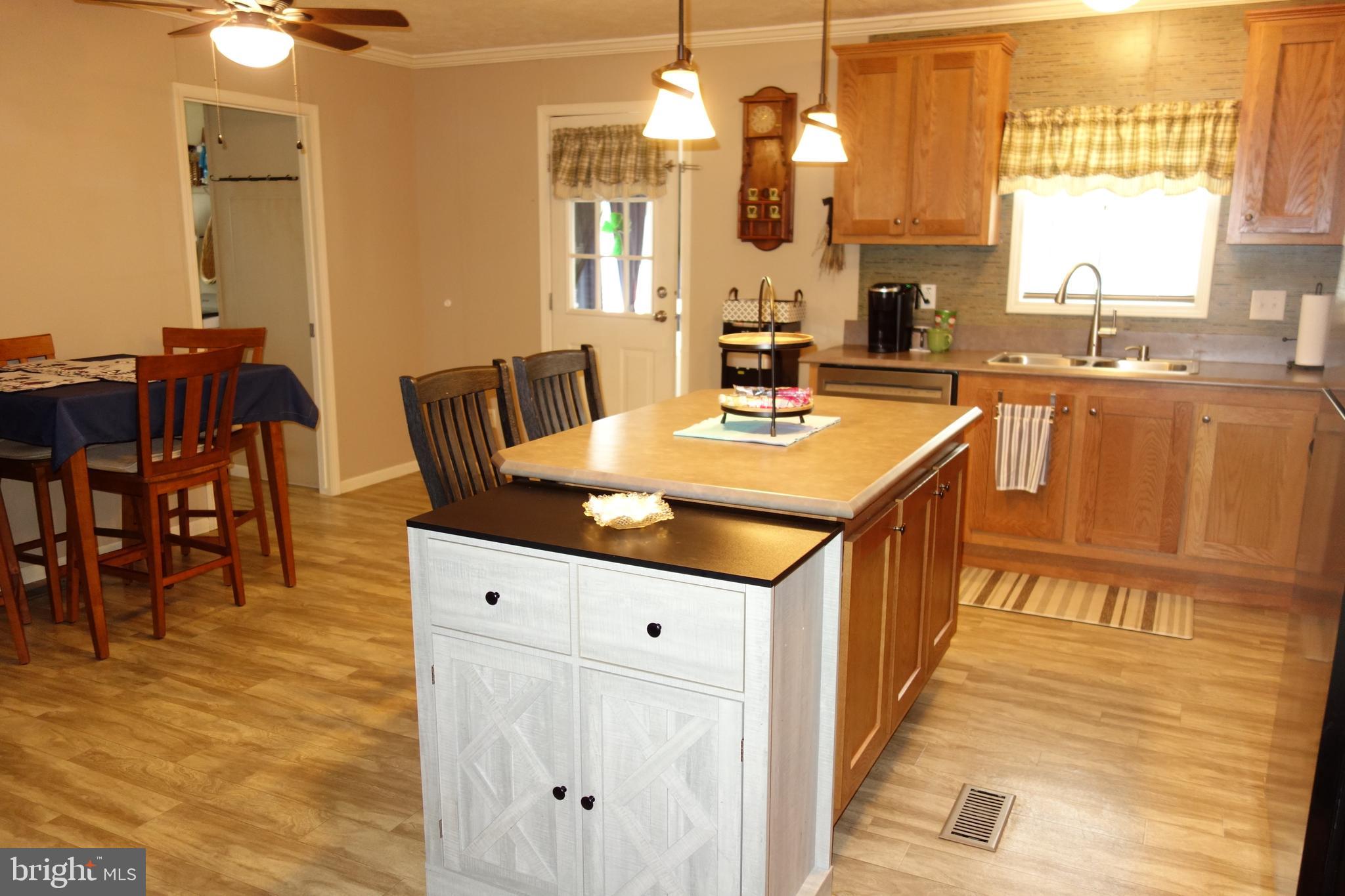 106 Circle Drive Nottingham, PA 19362 - Photo 4 of 16 a very nice looking dining room with a large dining table and a large window