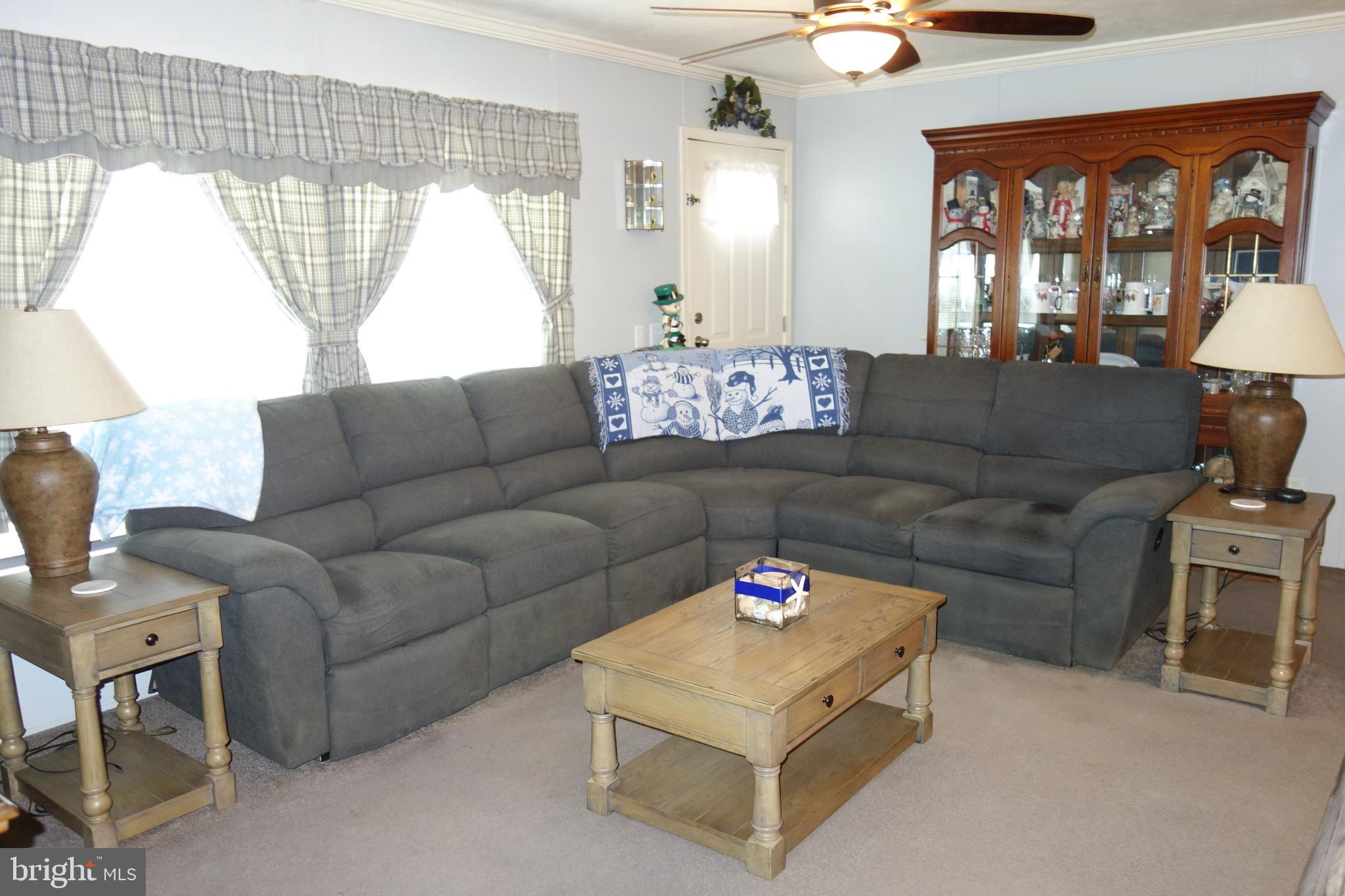 106 Circle Drive Nottingham, PA 19362 - Photo 9 of 16 a living room with furniture and a large window