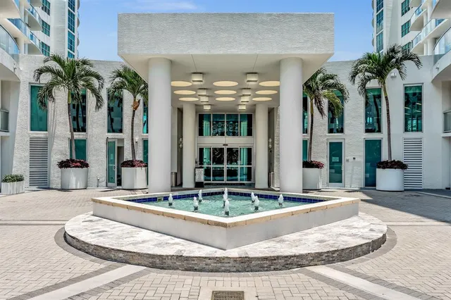 a view of a city and a lake from a balcony
