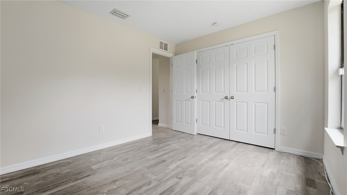 2701 East 18th Street Lehigh Acres, FL 33972 - Photo 15 of 24 a view of an empty room