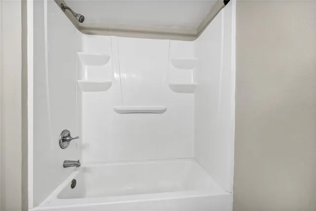 a group of people sitting in a living room