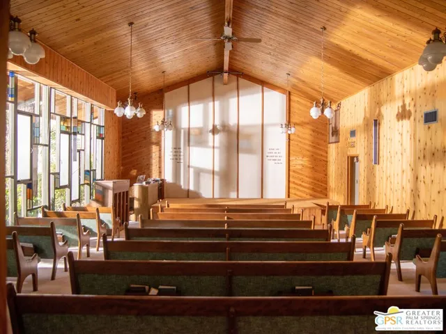 a living room with large windows