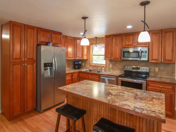 $360,000 | 8086 Narrow Gauge Road, Beulah, MI 49617