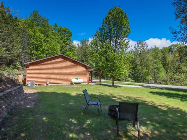 $360,000 | 8086 Narrow Gauge Road, Beulah, MI 49617