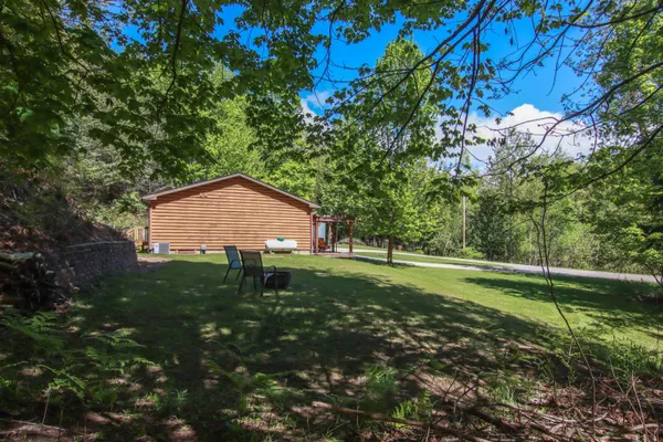 $360,000 | 8086 Narrow Gauge Road, Beulah, MI 49617