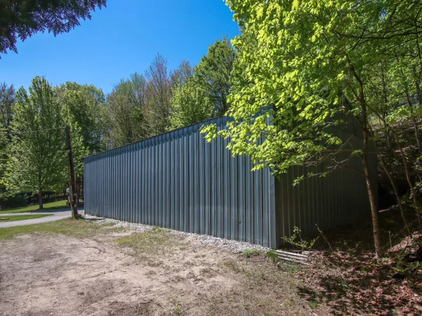 $360,000 | 8086 Narrow Gauge Road, Beulah, MI 49617
