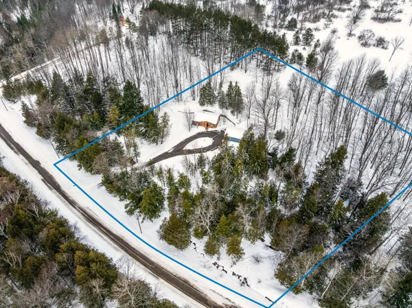 $360,000 | 8086 Narrow Gauge Road, Beulah, MI 49617