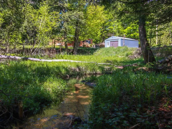 $360,000 | 8086 Narrow Gauge Road, Beulah, MI 49617