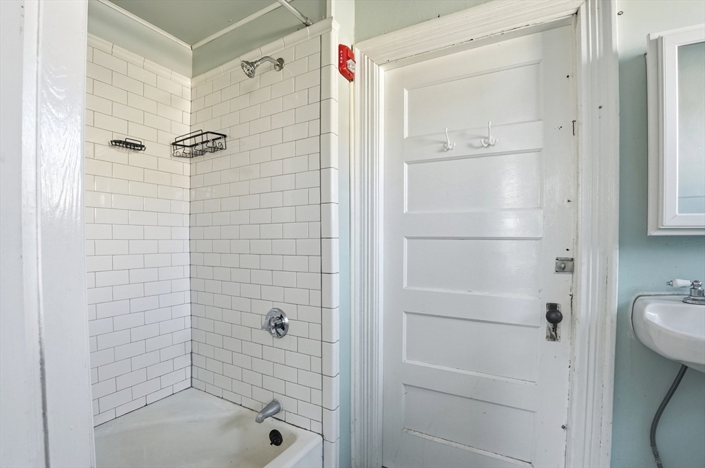 621 2nd Street Fall River, MA 02721 - Photo 14 of 42 a bathroom with a shower