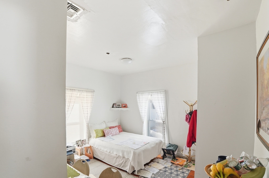 621 2nd Street Fall River, MA 02721 - Photo 16 of 42 a bedroom with a bed and a window