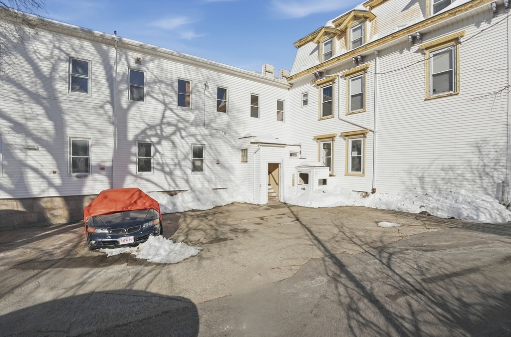 621 2nd Street Fall River, MA 02721 - Photo 3 of 42 a front view of a building with large trees