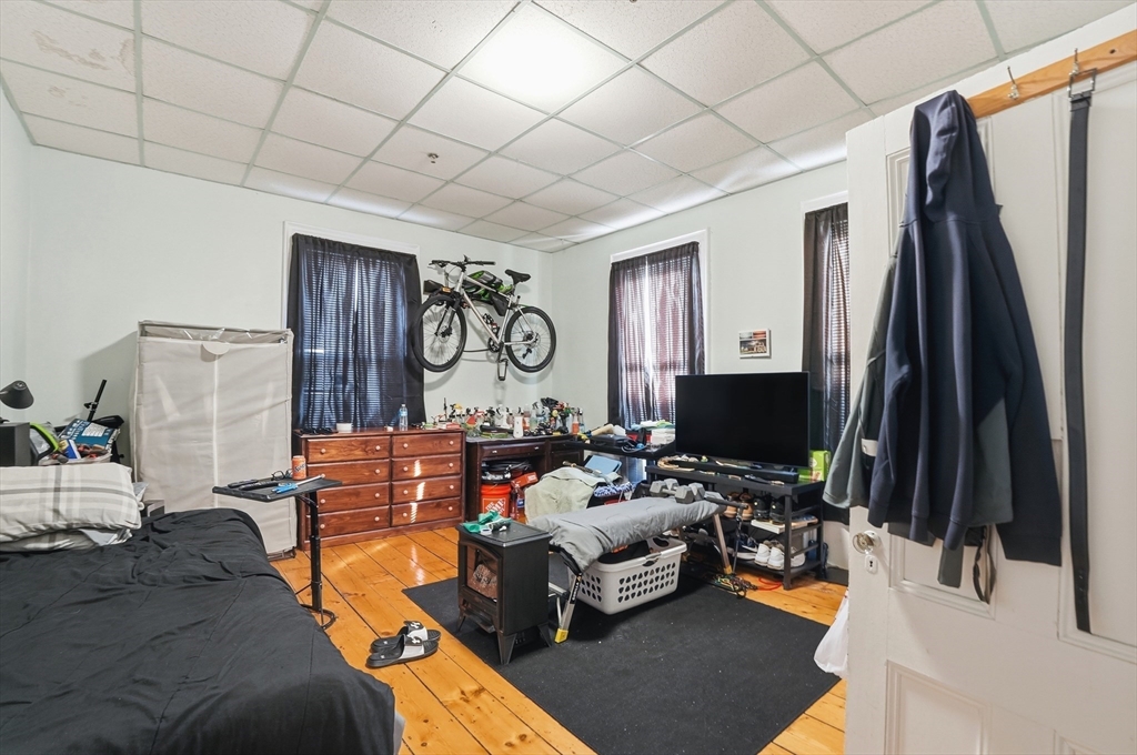 621 2nd Street Fall River, MA 02721 - Photo 35 of 42 a living room with furniture a window and a flat screen tv
