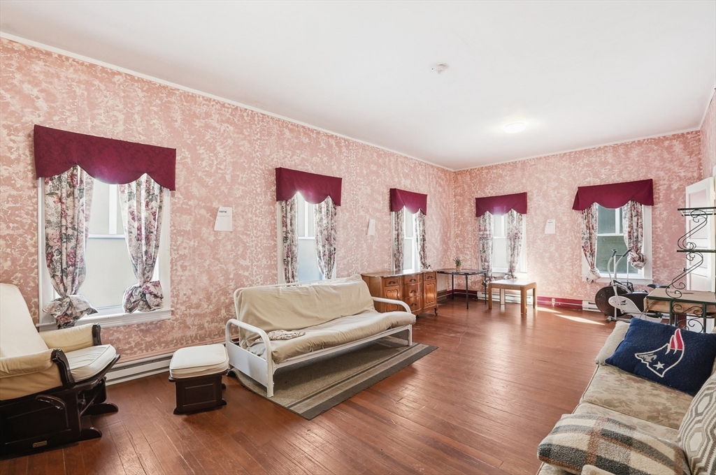 621 2nd Street Fall River, MA 02721 - Photo 4 of 42 a living room with furniture and a large window