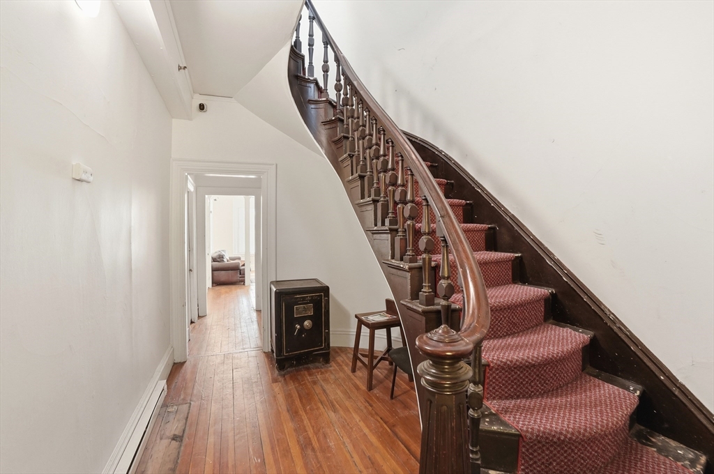 621 2nd Street Fall River, MA 02721 - Photo 8 of 42 a view of entryway and hall with wooden floor