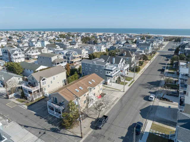 an aerial view of a building with outdoor space