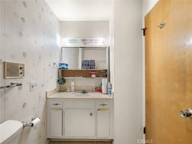 a room with a bed and a window