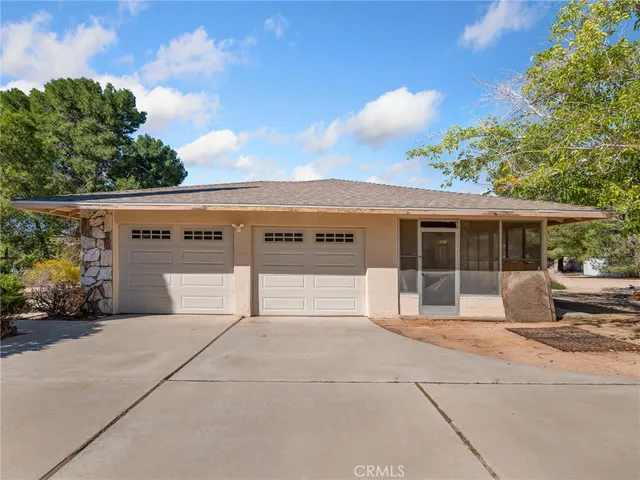 a view of a house with a street