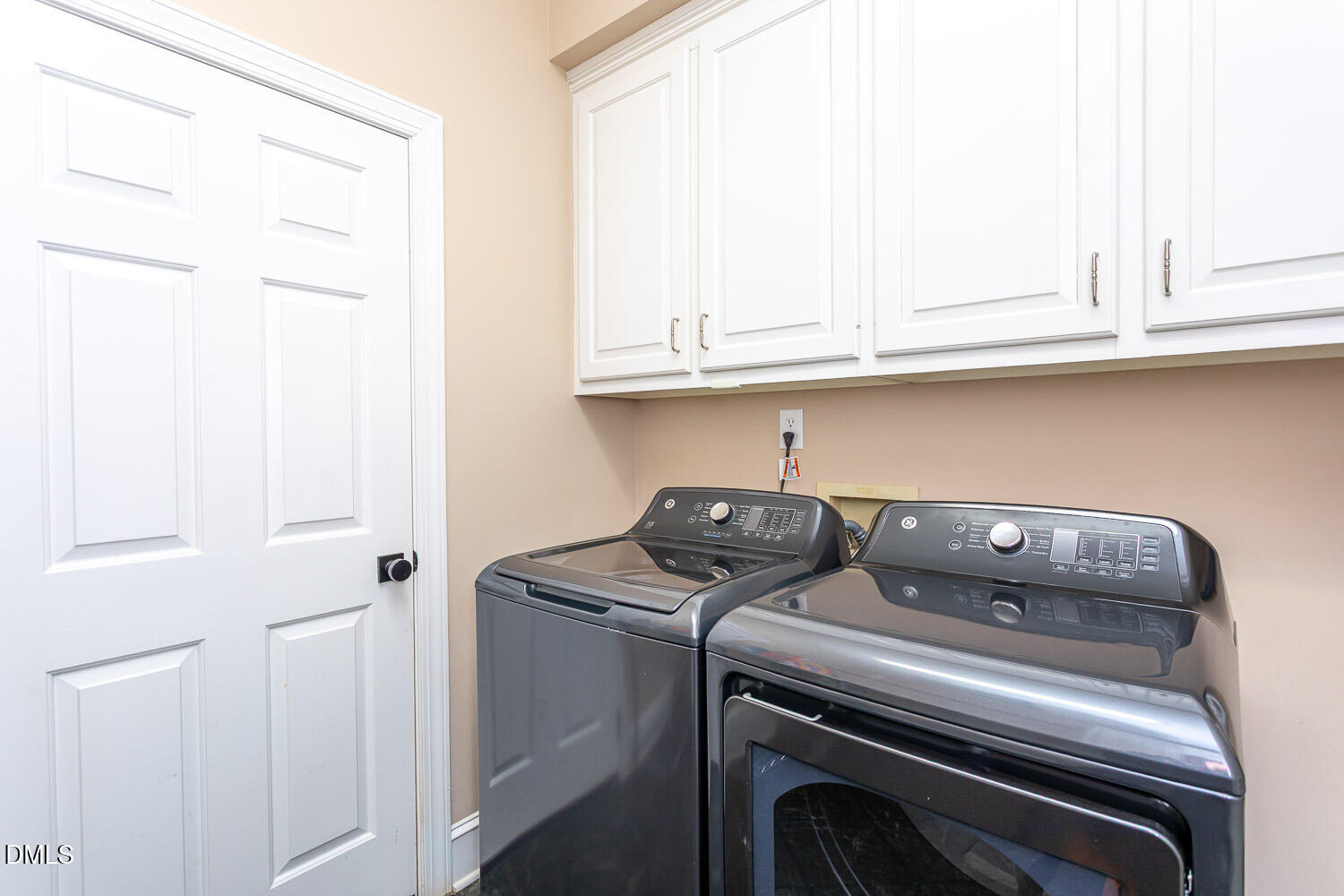 8509 Towneley Place Raleigh, NC 27615 - Photo 30 of 36 a view of washer and dryer