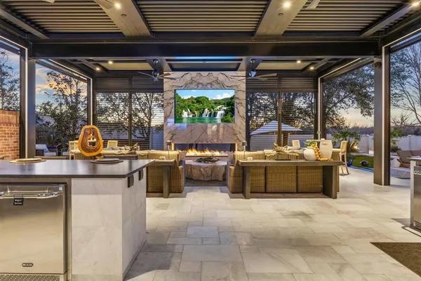 a view of a patio and a table and chairs