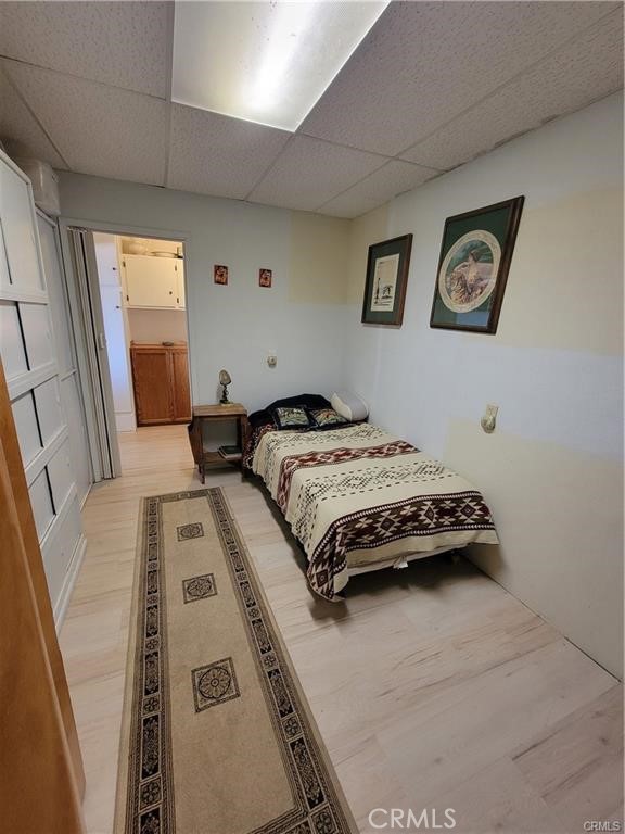 5566 Oleta Road Landers, CA 92285 - Photo 14 of 21 a bedroom with a bed and a window