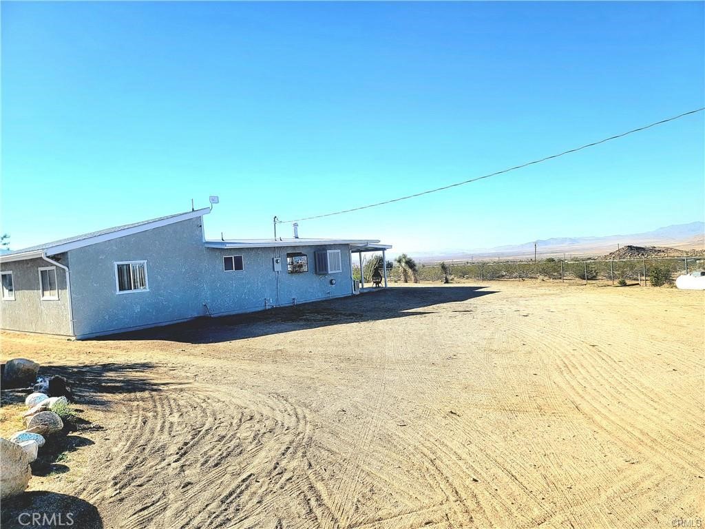 5566 Oleta Road Landers, CA 92285 - Photo 18 of 21 a view of swimming pool and lake view