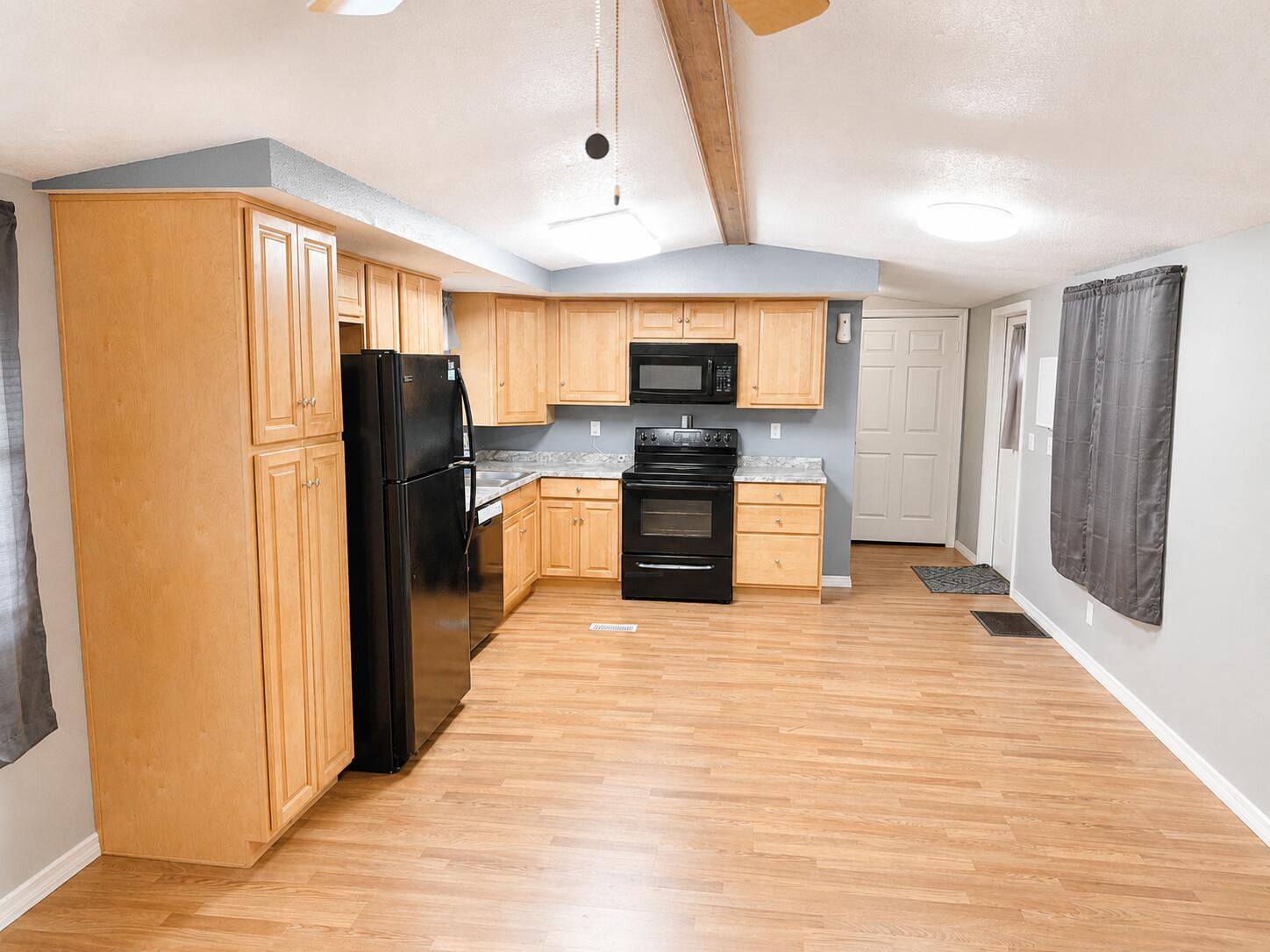2547 Chatham Way Northeast Palm Bay, FL 32905 - Photo 19 of 24 a kitchen with stainless steel appliances a refrigerator and a stove