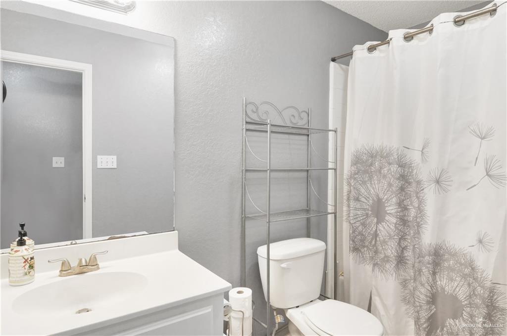 2020 Lemon Tree Court Edinburg, TX 78539 - Photo 9 of 16 a bathroom with a sink toilet and shower