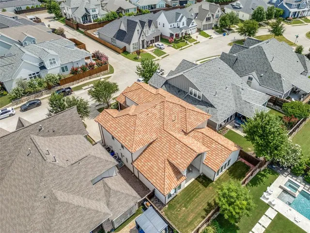 an aerial view of residential house with outdoor space