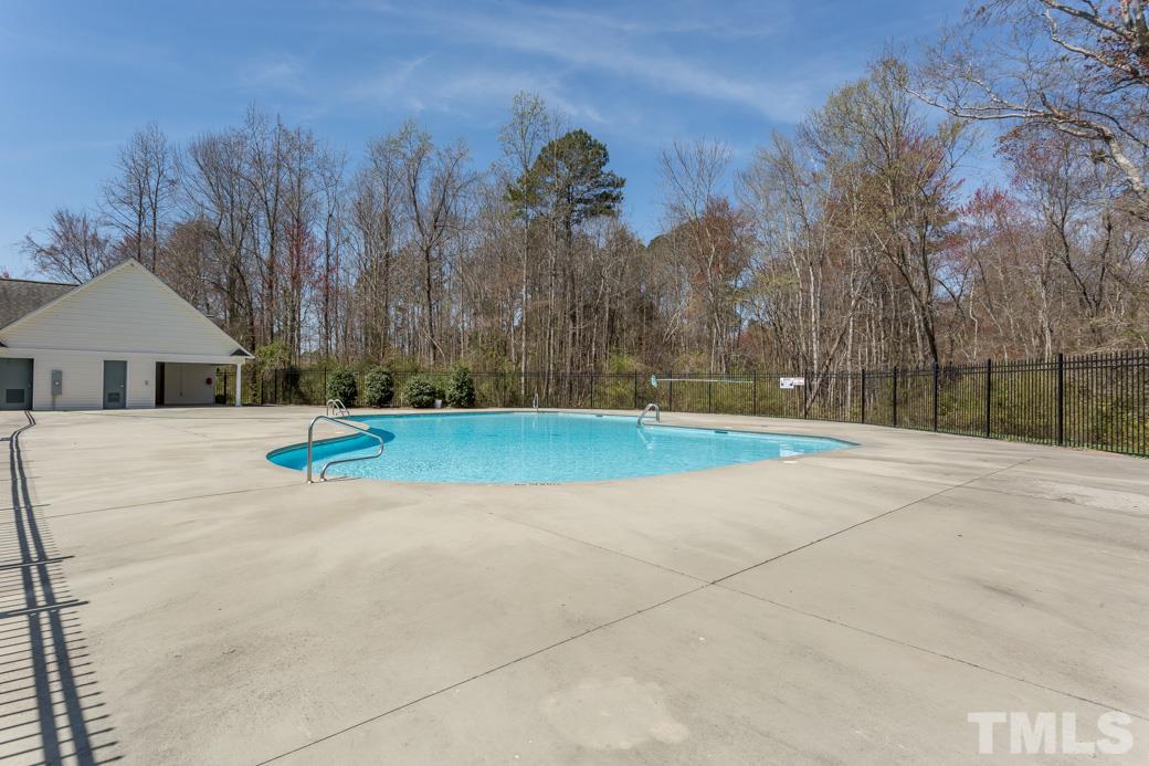 4357 Karlbrook Lane Raleigh, NC 27616 - Photo 25 of 25 a view of a house with a backyard