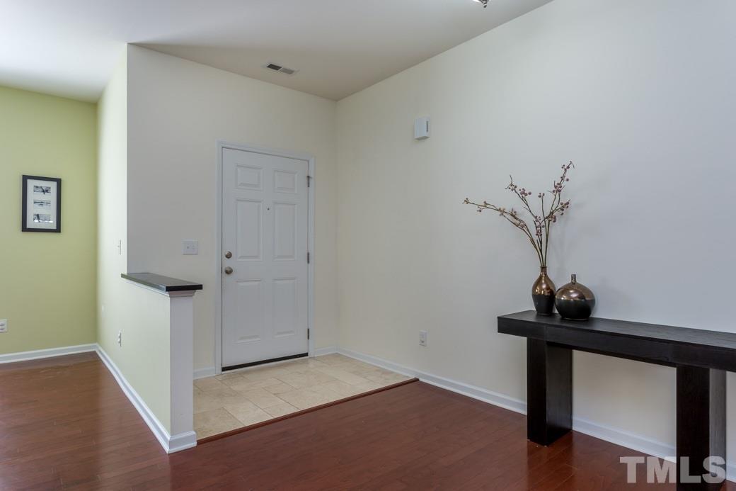 4357 Karlbrook Lane Raleigh, NC 27616 - Photo 5 of 25 a view of a room with a potted plant