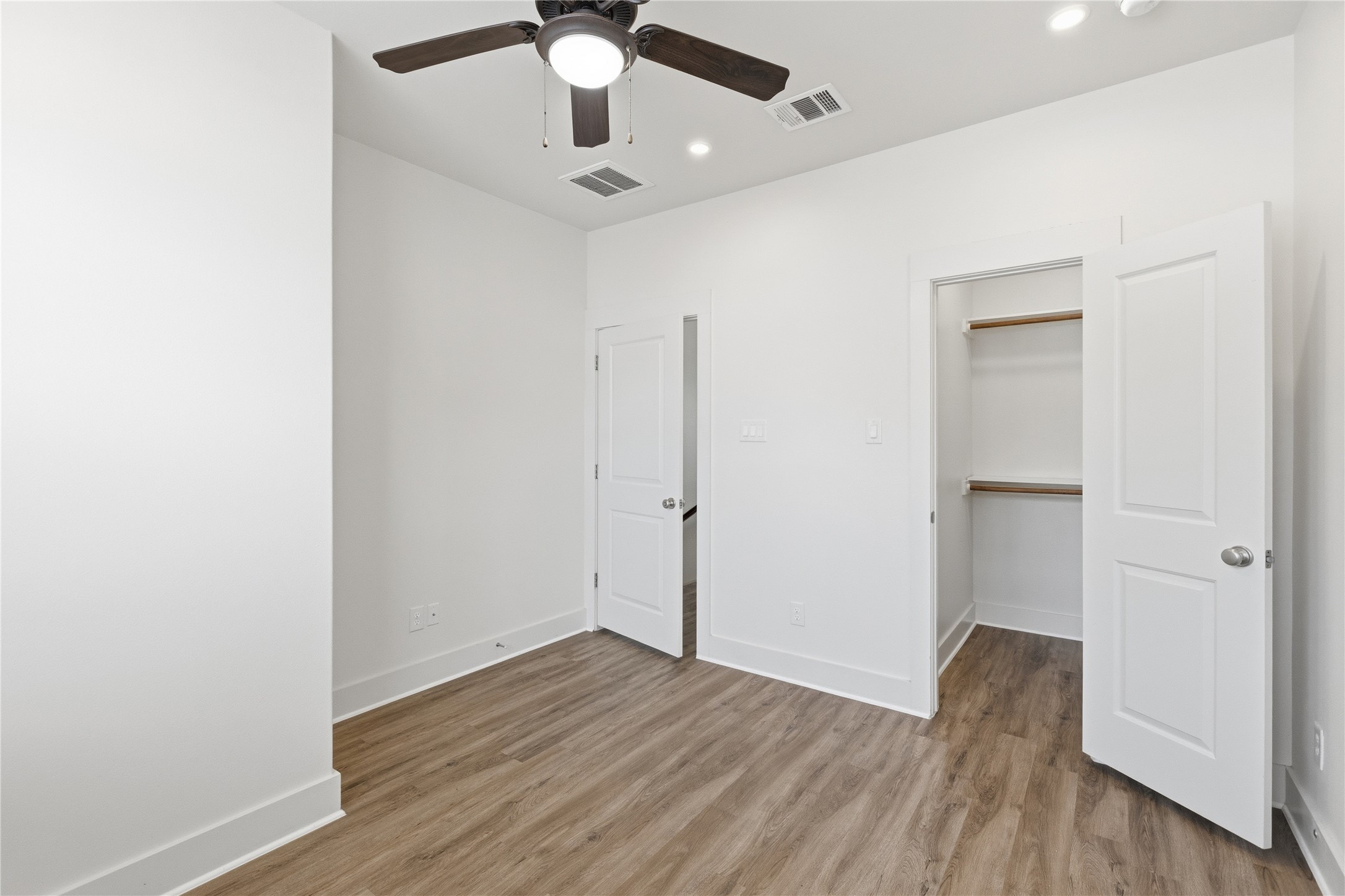 4124 Valley View Road, Unit 4A & 4B Austin, TX 78704 - Photo 17 of 40 A well-lit bedroom with ample closet space and durable flooring.