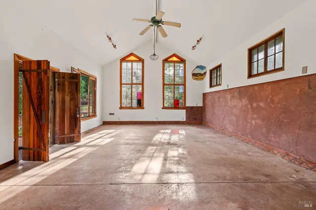 a view of a yard with a tree