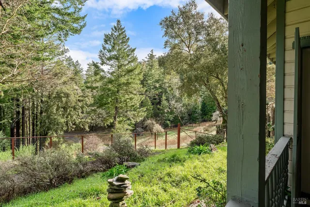 a view of an empty room with windows