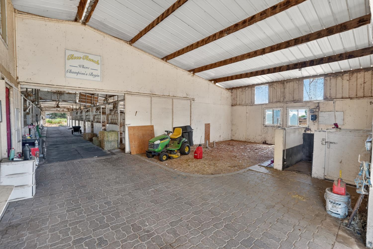 24390 North Jack Tone Road Acampo, CA 95220 - Photo 8 of 40 Breeding Barn. 16- 12x24 stalls, vet room, breeding stock, tack room, misting system with auto water and lights.