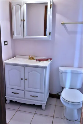 a view of a house with a tree