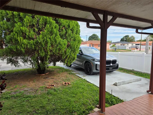 a house view with a garden space