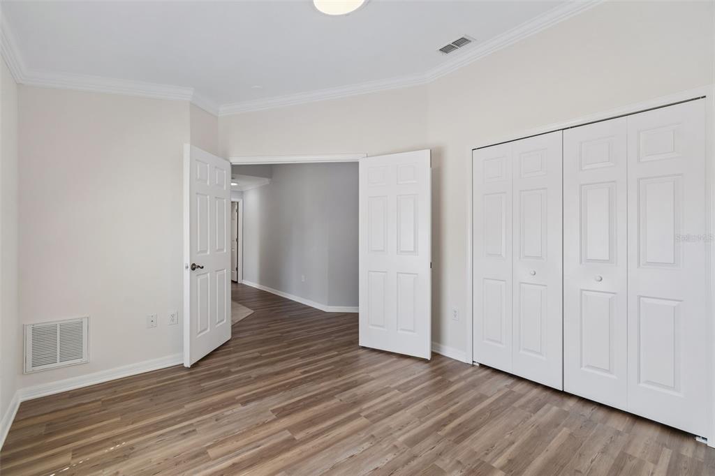 18630 Rolling Hills Loop Hudson, FL 34667 - Photo 9 of 64 a view of an empty room with wooden floor